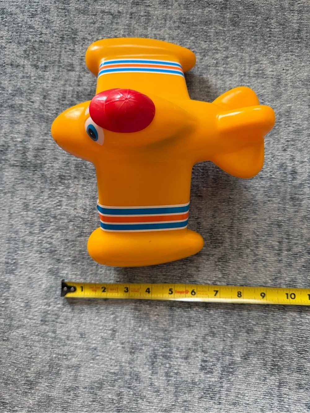 Vintage 1980s airplane toy- red hat and stripes on wings
